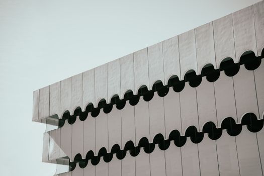 Abstract view of modern architectural structure with unique geometric design.