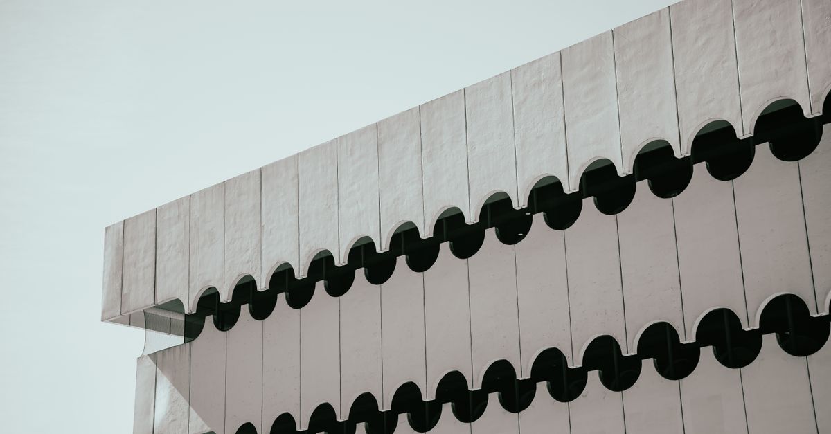 Abstract view of modern architectural structure with unique geometric design.