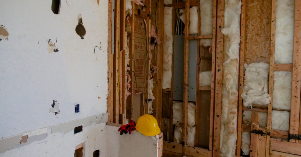 An interior space undergoing reconstruction and demolition for renovation.