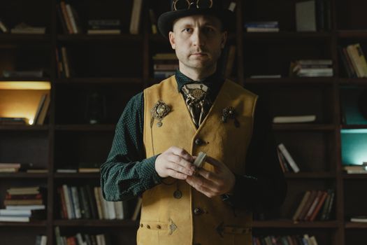 A magician in vintage attire performing card tricks in a library, exuding mystery and charm.