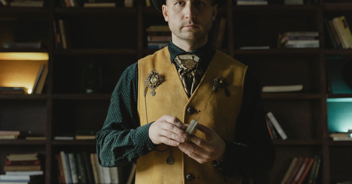 A magician in vintage attire performing card tricks in a library, exuding mystery and charm.