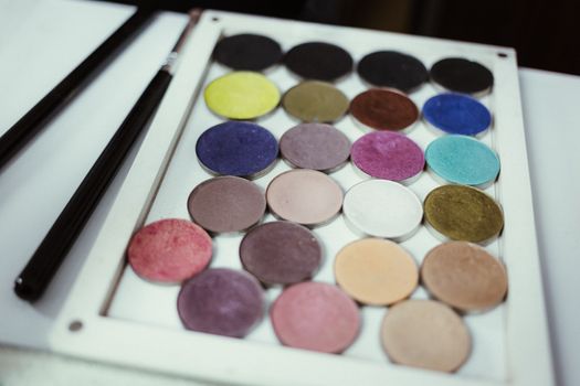 A diverse palette of colorful eyeshadows perfect for makeup artistry.