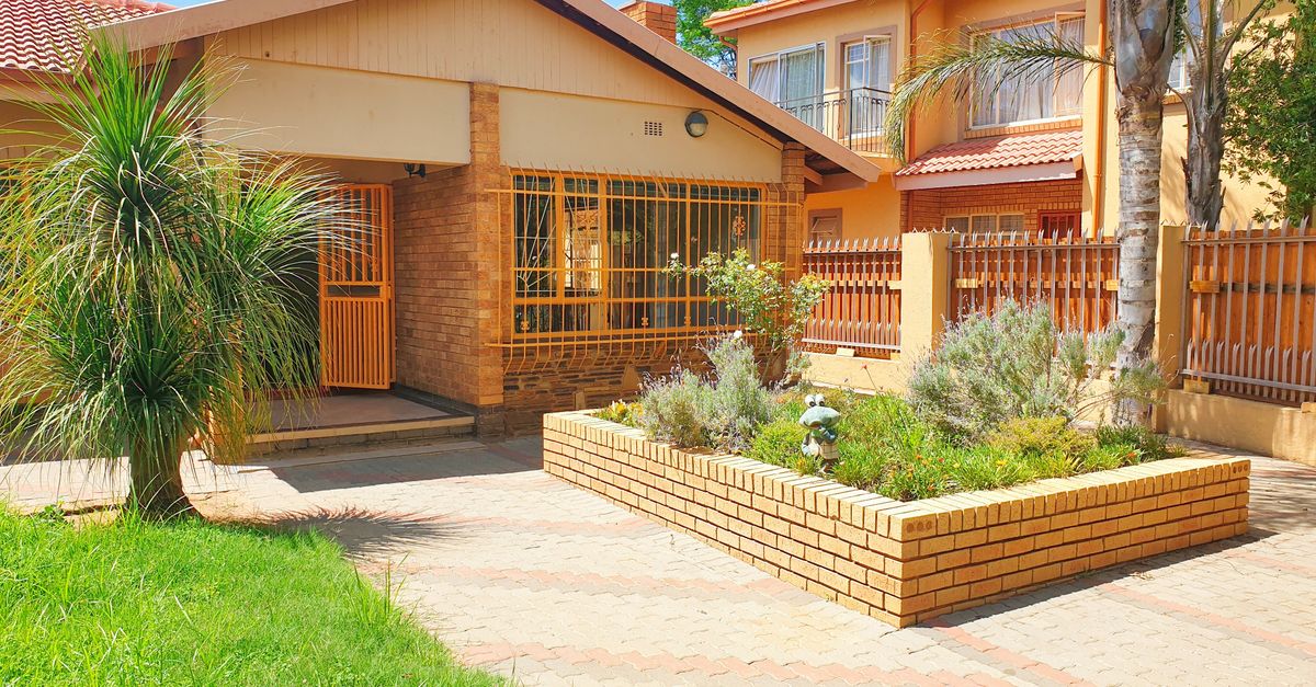 Beautiful suburban home in Pretoria, featuring lush greenery and modern architecture.