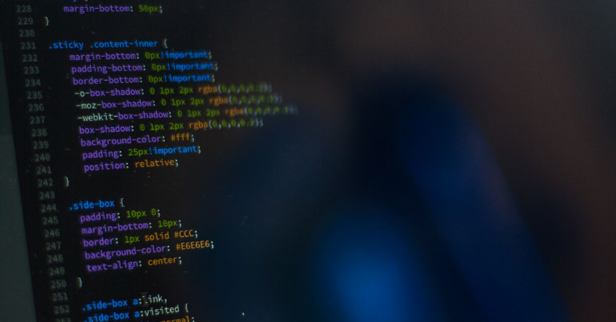 Close-up of CSS code displayed on a computer monitor, showcasing web development.