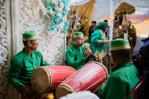 Musicians perform at a traditional wedding ceremony in Kendari, Southeast Sulawesi, Indonesia.